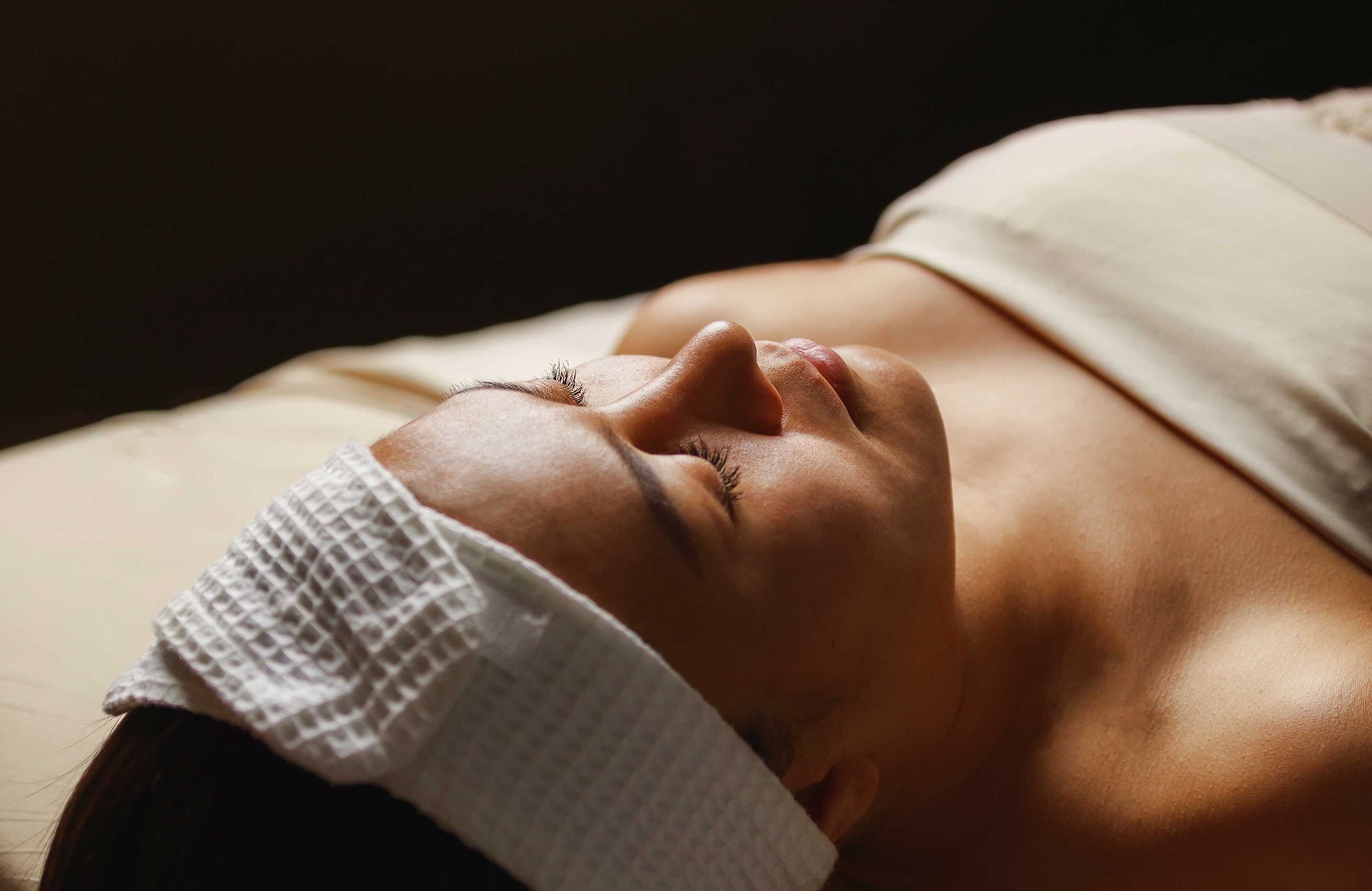 Woman relaxing on a massage table.